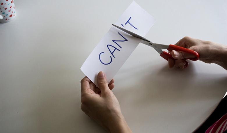 Can/t Scissors cutting word ‘can’t’ into ‘can’