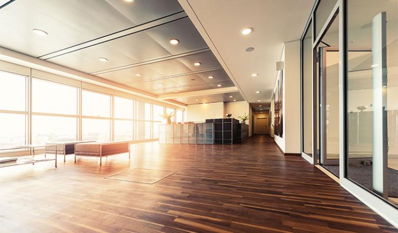 Photo of an entrance, lobby and lounge inside a public building.