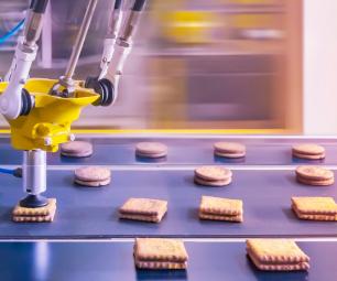 A robot making biscuits in a factory
