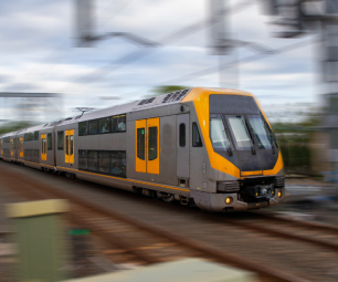 Moving train in focus with blurred background