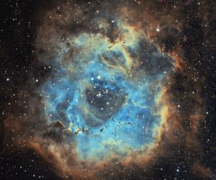 A blue and orange nebula in space
