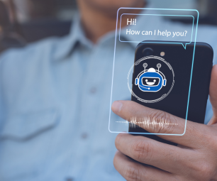 Man holding a smartphone with a chatbot graphic overlay.