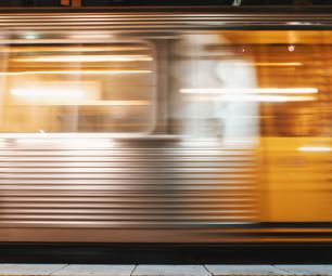 A train in motion at a station