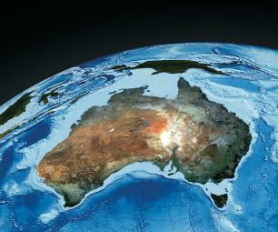 Satellite photo of Australia with swirling ocean.