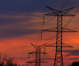 Powerlines in a sunset sky