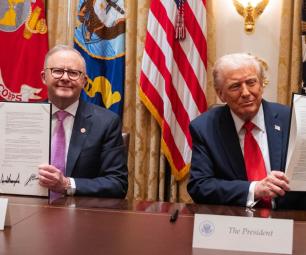 Photo around a table at the signing event