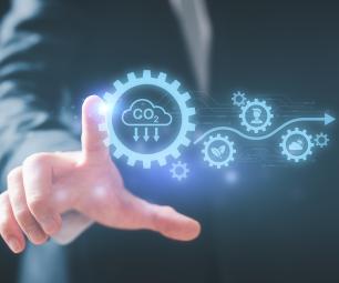 Hand touching digital icons symbolising sustainable industries