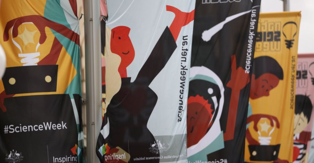 Photo of illustrated characters on banners