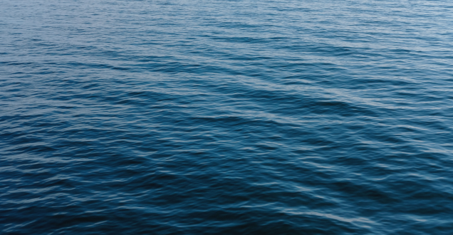 Close up shot of calm, blue ocean waters 