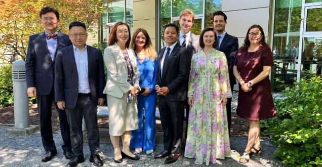 International Network of AI Safety Institutes meeting attendees pose for a photo