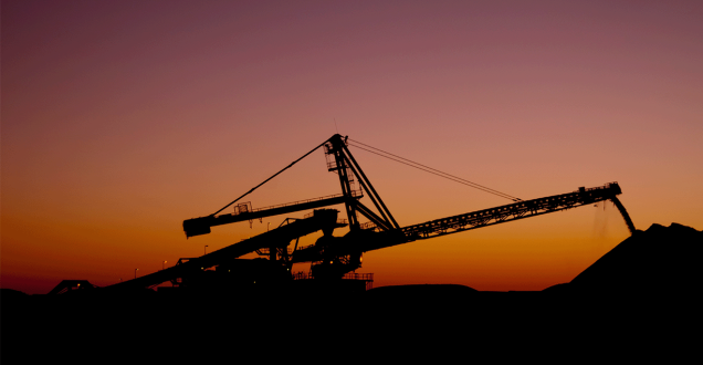 Silhouette of modern mining equipment on a mine site