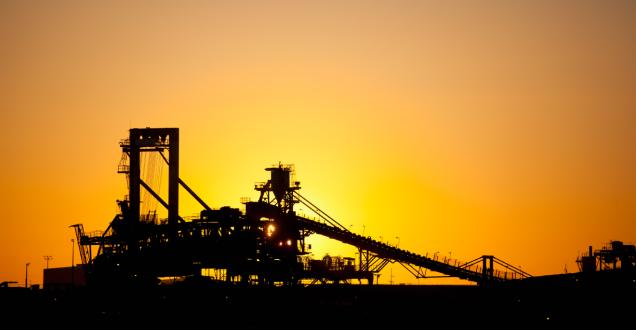 Silhouette of modern mining equipment on a mine site