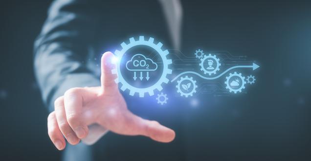 Hand touching digital icons symbolising sustainable industries