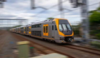 Moving train in focus with blurred background