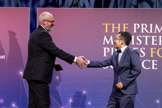 Professor Yao Zheng with the Minister