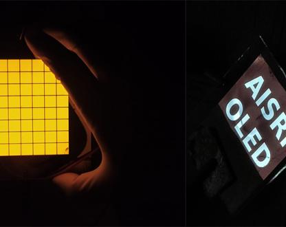 Yellow light with grid lines and sign 'AISRF OLED'