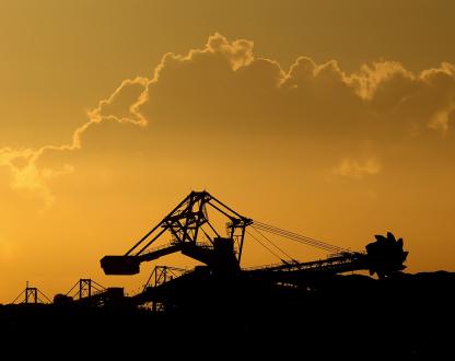 Silhouette of modern mining equipment on a mine site