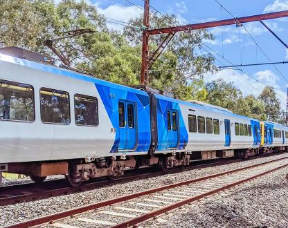 Image of a Melbourne Metro Train moving over rail.
