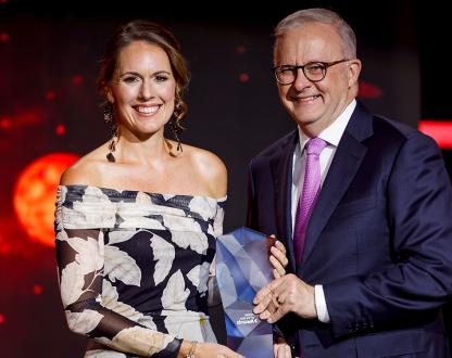 Australian Prime Minister Anthony Albanese presenting Katherine Bennell-Pegg with the 2026 Australian of the Year honour. 