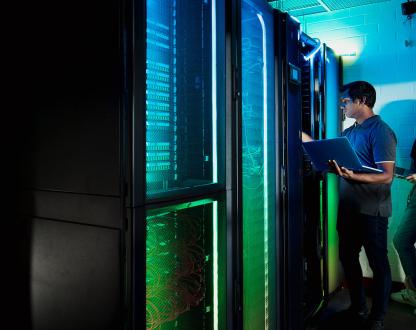Technicians working in a server room