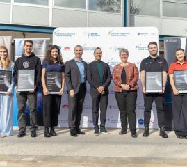 Students being awarded certificate