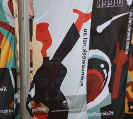 Photo of illustrated characters on banners