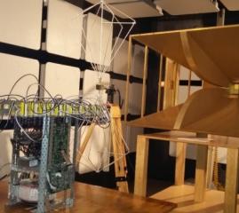 Complex electronic device with wires in white soundproof chamber